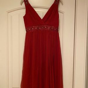 Red silk cocktail dress with beading.